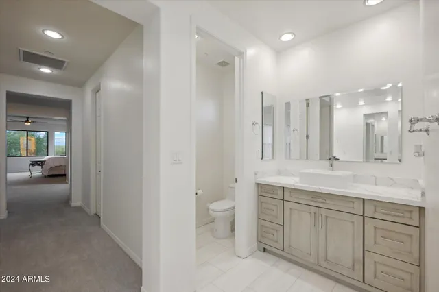 a view of a patio with swimming pool table and chairs