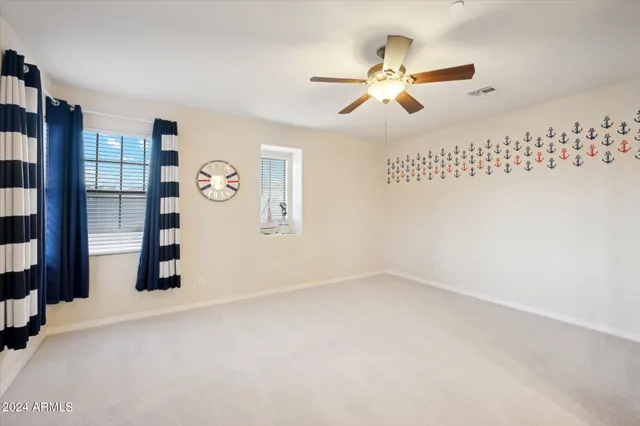 a picture of a bathroom with a sink and a mirror