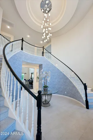 a view of a patio with a table and a fire pit