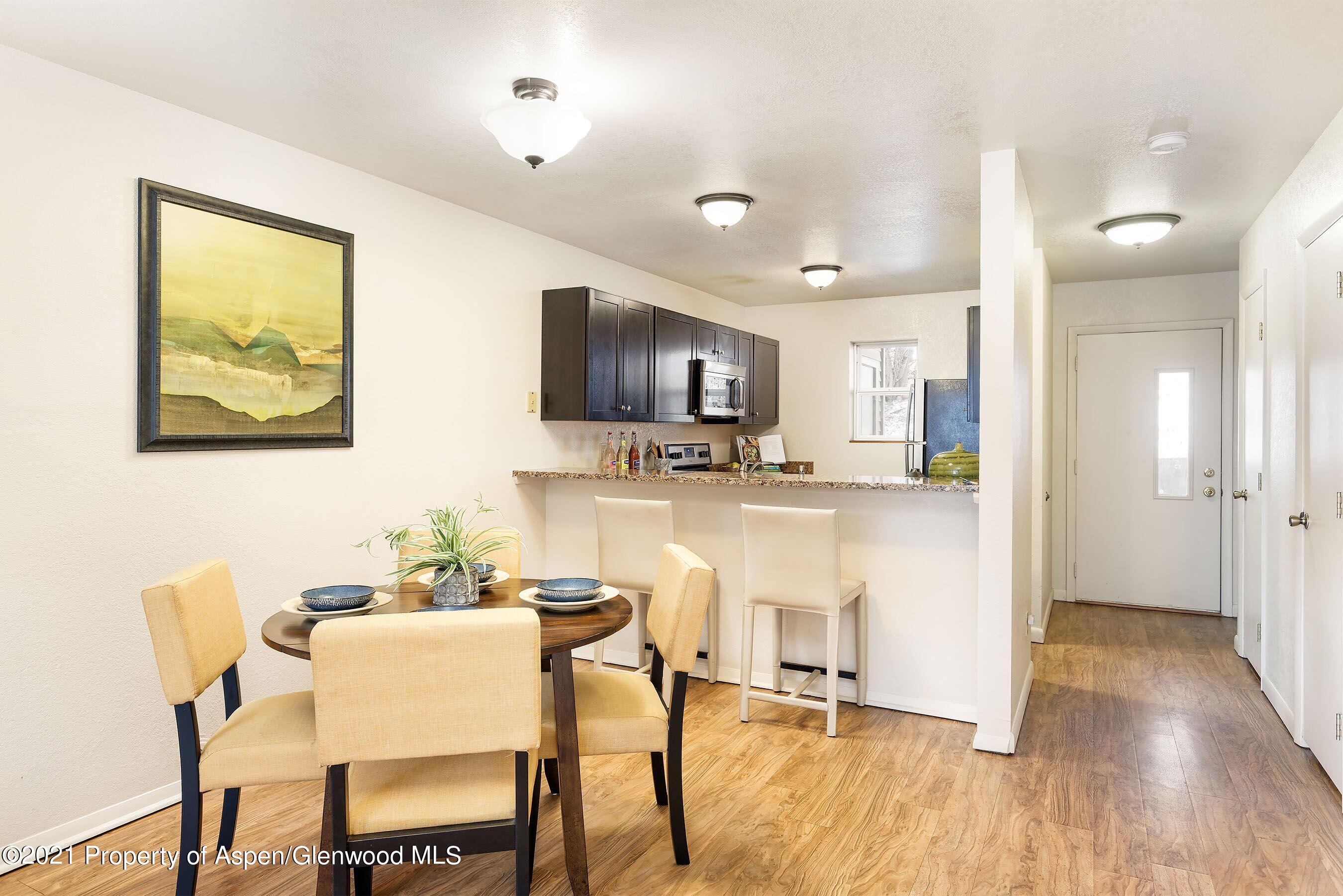 291 Park Avenue, Unit J4 Basalt, CO 81621 - Photo 5 of 12 291 staged new dining