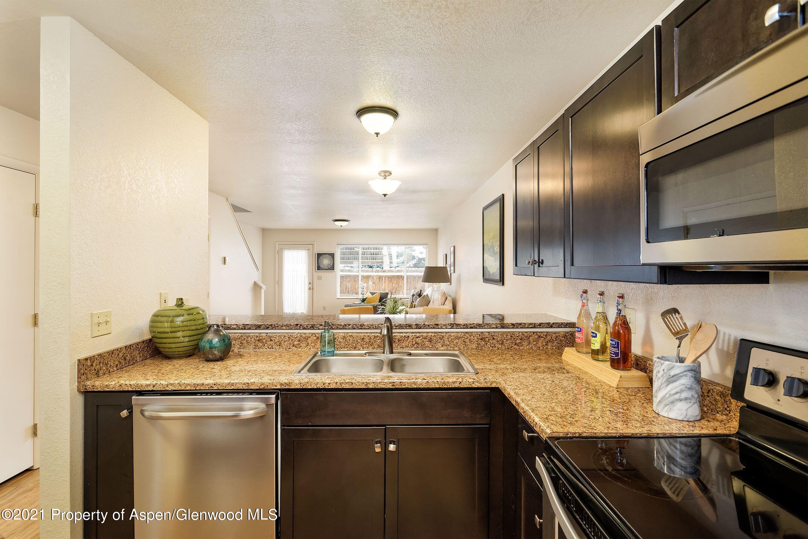 291 Park Avenue, Unit J4 Basalt, CO 81621 - Photo 7 of 12 291 kitchen staged 2
