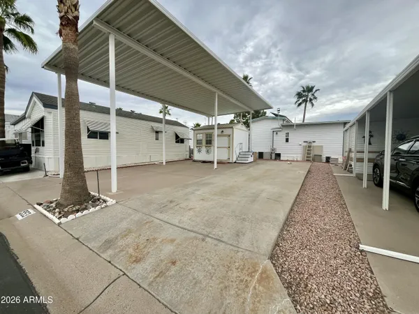 a view of a garage with sitting area