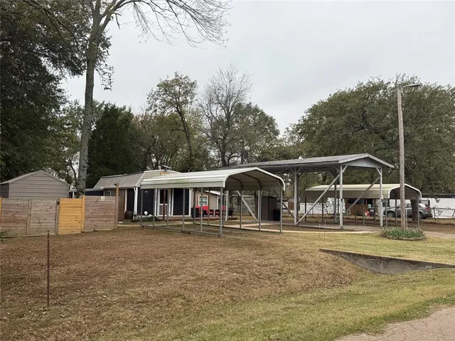 a front view of a house with swimming pool