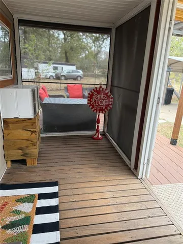 a view of front door and deck