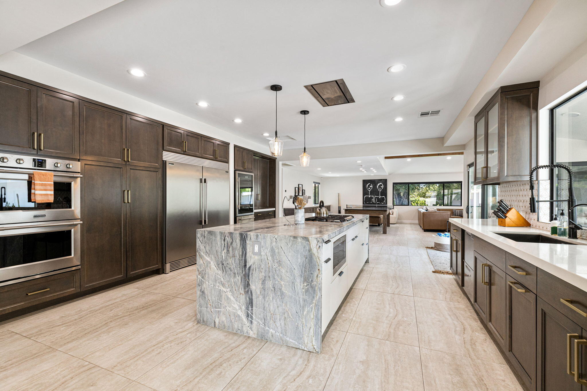 45655 Apache Road, Unit D Indian Wells, CA 92210 - Photo 12 of 31 a large kitchen with stainless steel appliances lots of counter space