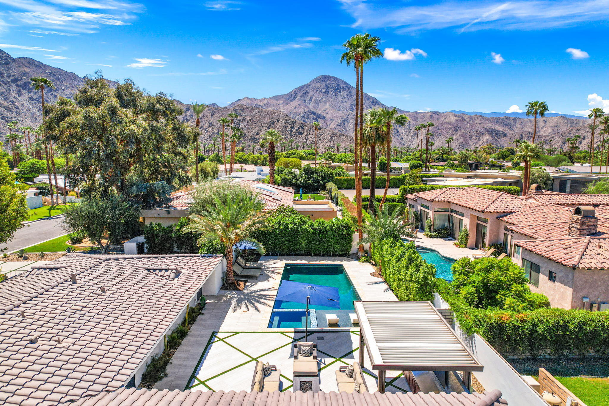 45655 Apache Road, Unit D Indian Wells, CA 92210 - Photo 4 of 31 a picture of a city with lots of buildings