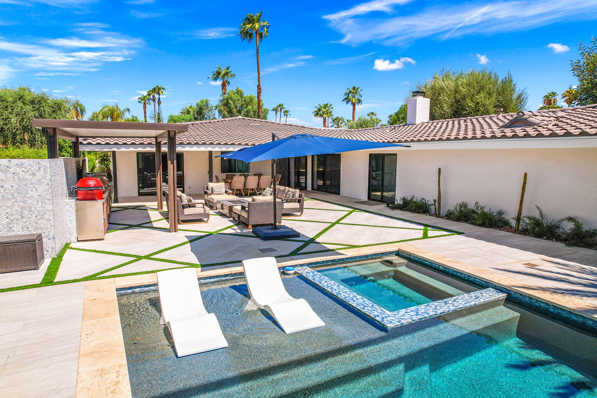 45655 Apache Road, Unit D Indian Wells, CA 92210 - Photo 5 of 31 a view of a patio with a table and chairs