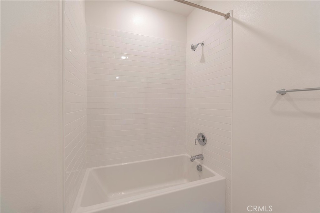 121 Baluster Irvine, CA 92618 - Photo 20 of 80 a white bath tub sitting next to a shower