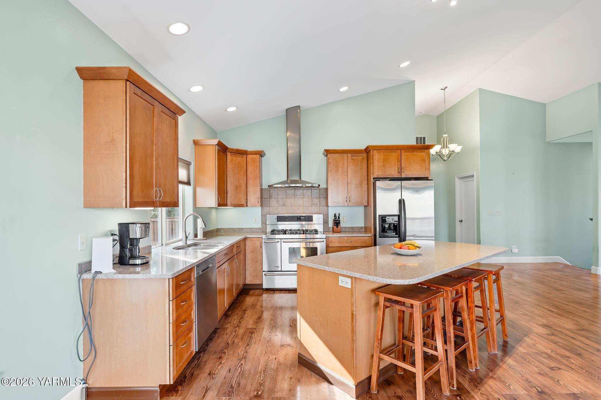 1575 Nile Road Naches, WA 98937 - Photo 17 of 51 a large kitchen with stainless steel appliances lots of counter space and a sink