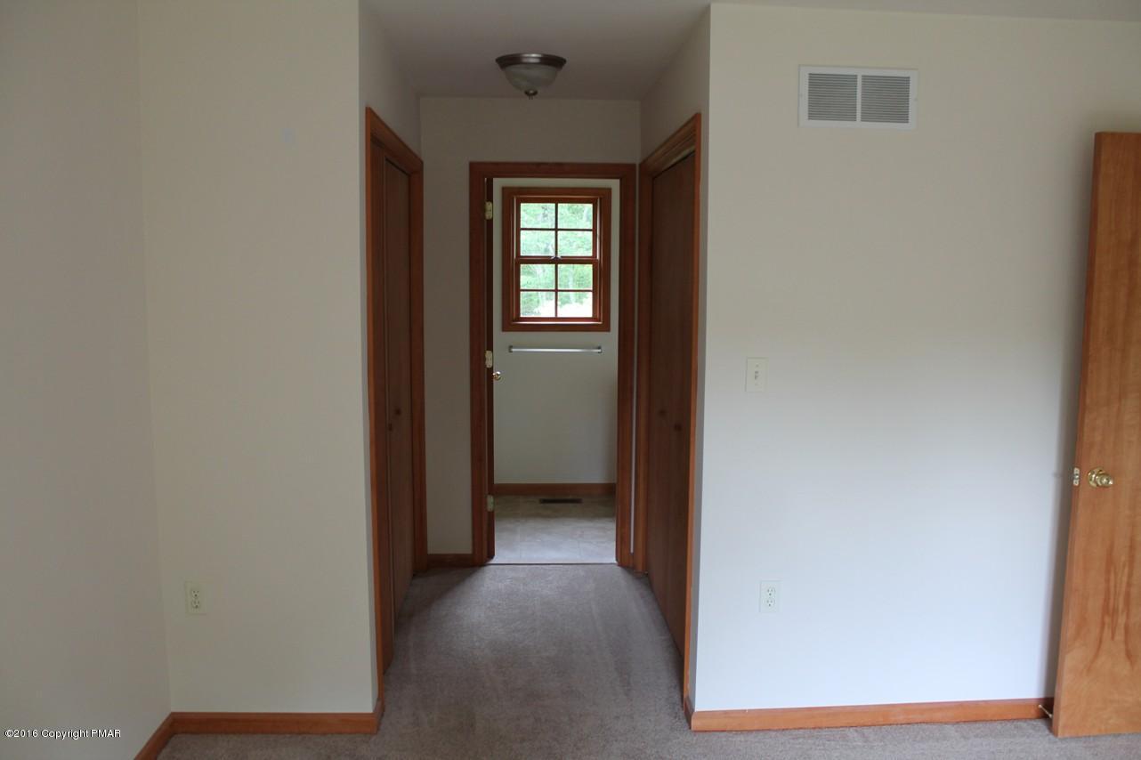 161 Granite Road Long Pond, PA 18334 - Photo 13 of 14 a view of a hallway with wooden floor