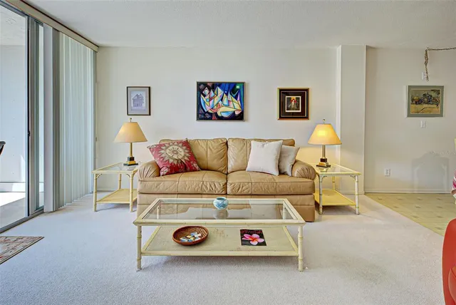 a living room with a couch and a table