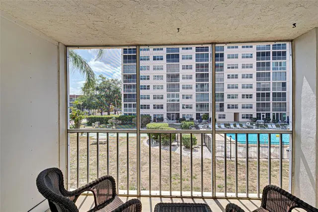 a view of a large window and chair