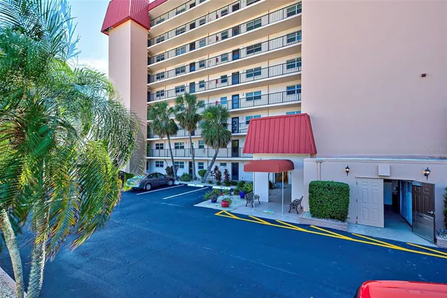 a house view with a sitting space and garden space