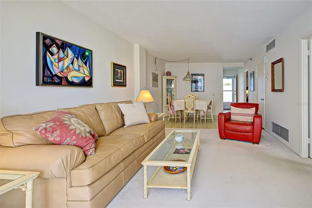 a living room with furniture and a couch