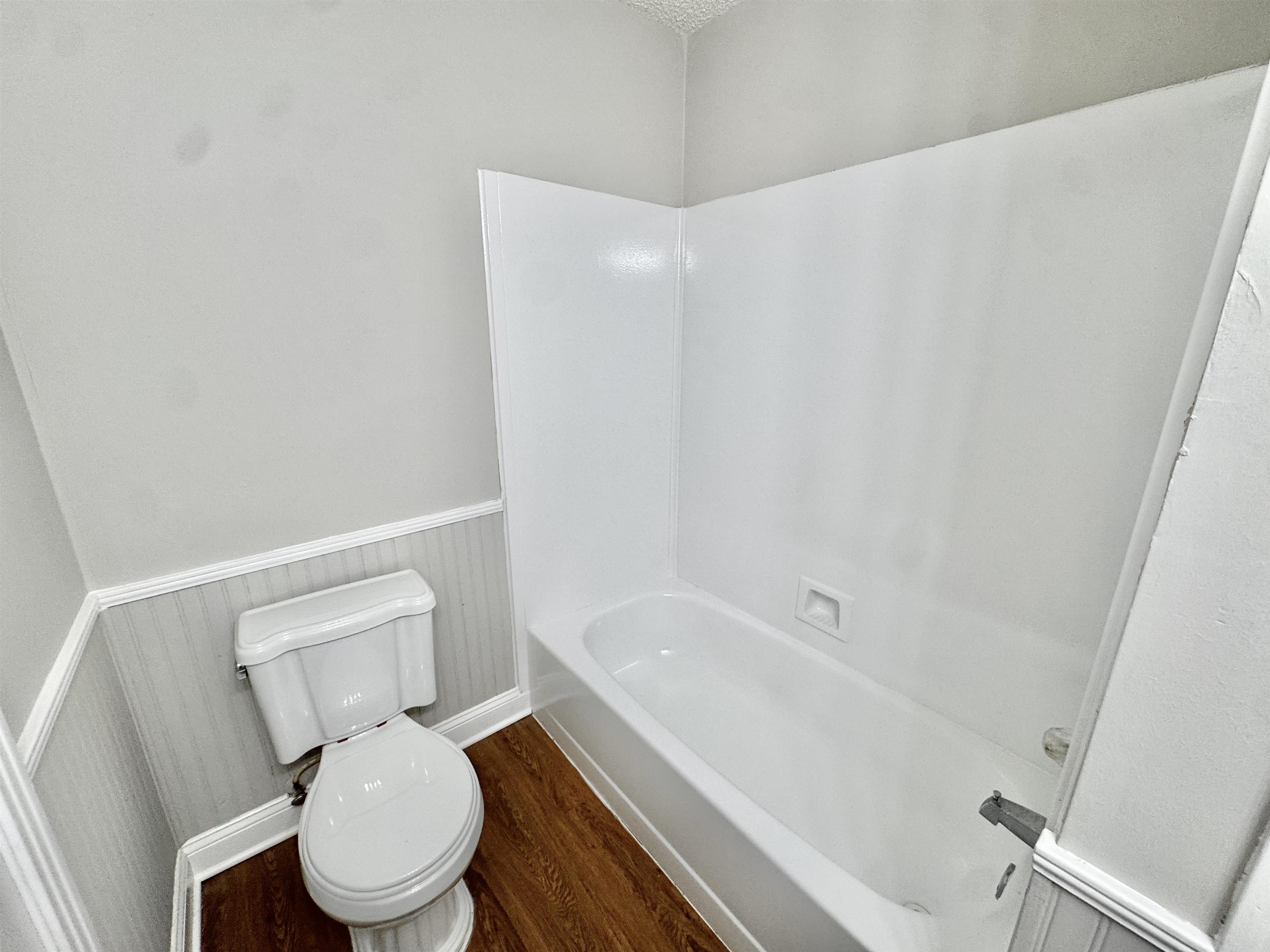 3334 Snow Ridge Cove Memphis, TN 38115 - Photo 10 of 38 a white toilet sitting next to a bath tub