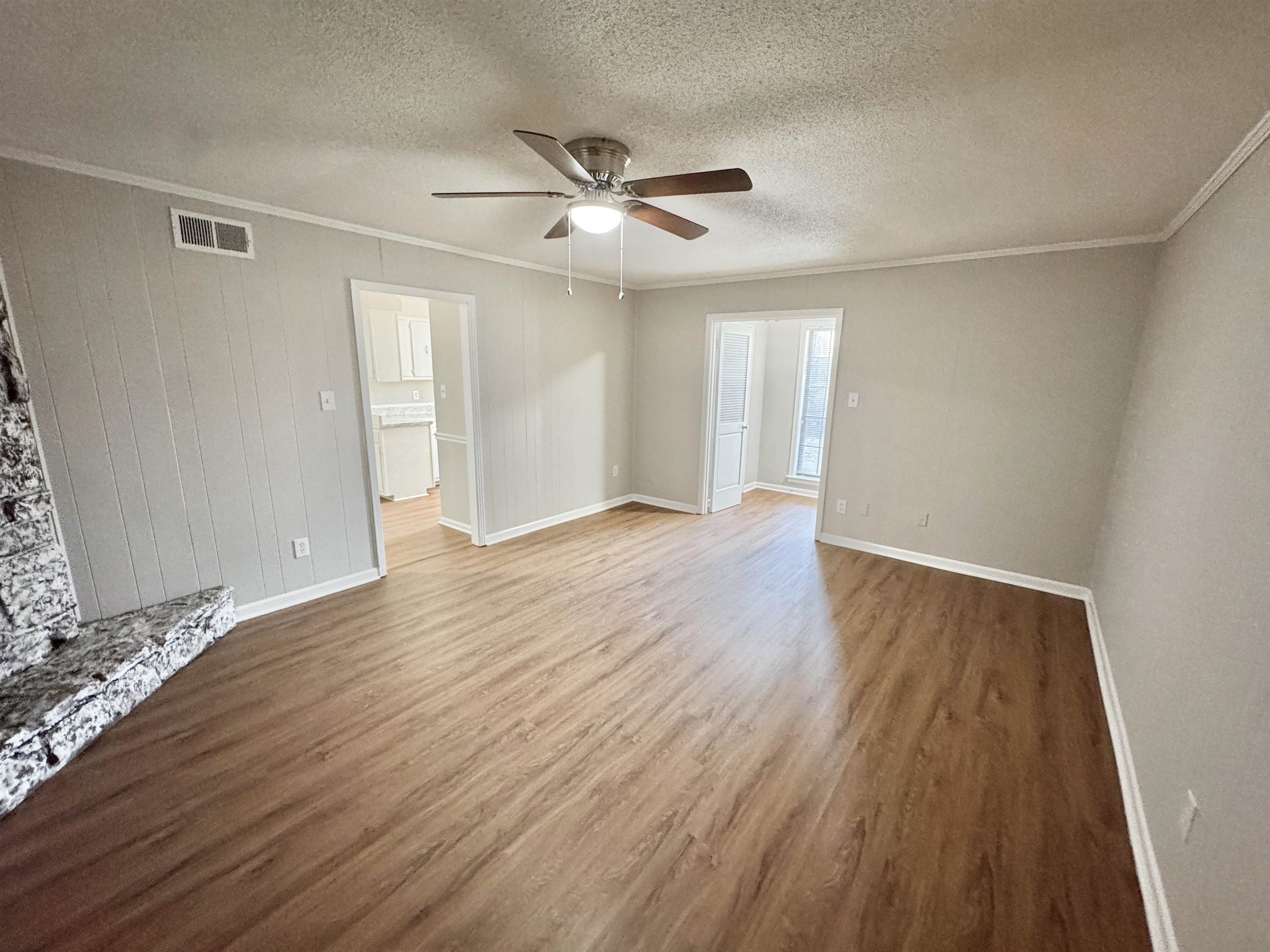 3334 Snow Ridge Cove Memphis, TN 38115 - Photo 24 of 38 wooden floor in an empty room with a window