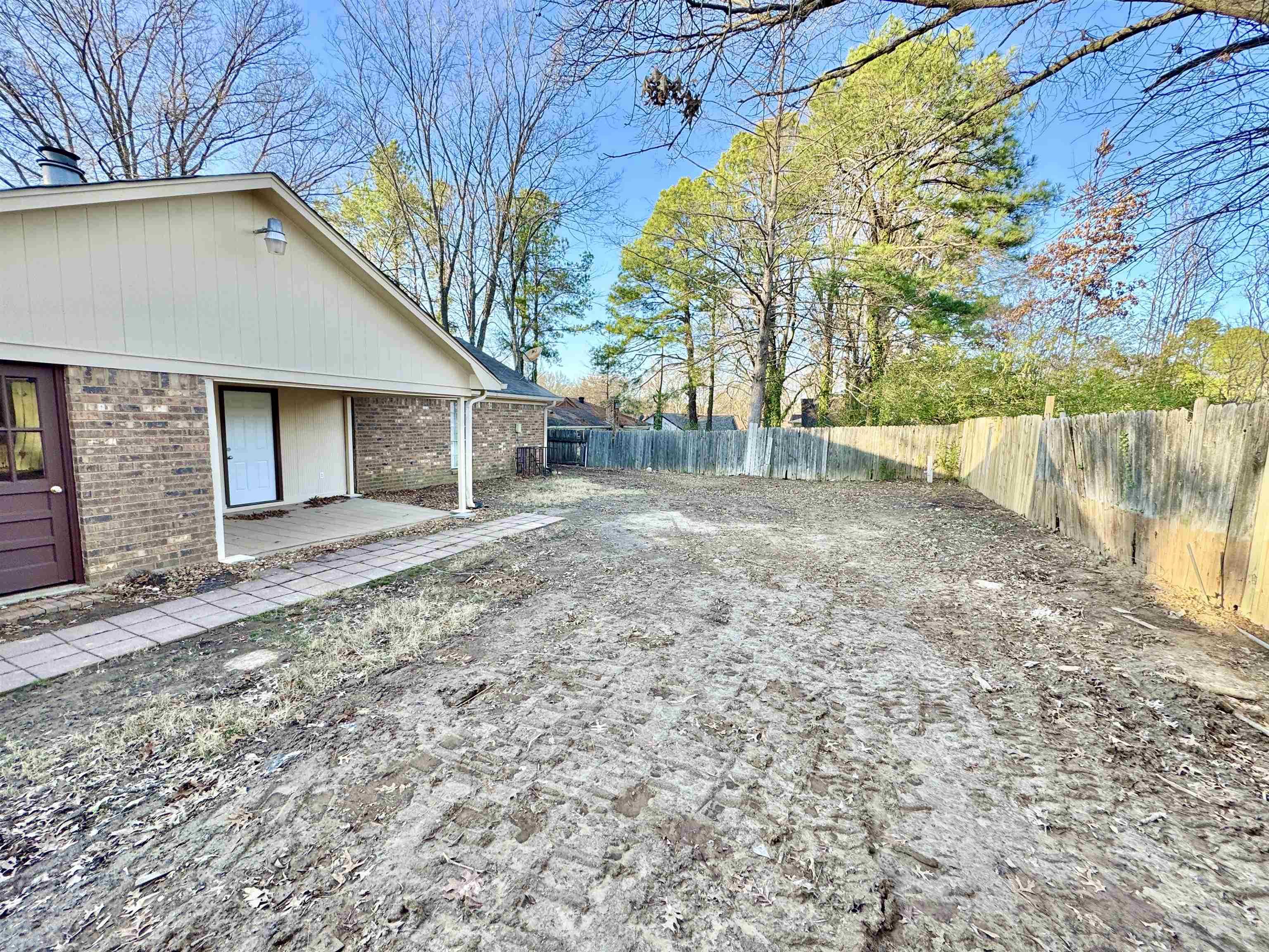 3334 Snow Ridge Cove Memphis, TN 38115 - Photo 31 of 38 a view of a house with a yard