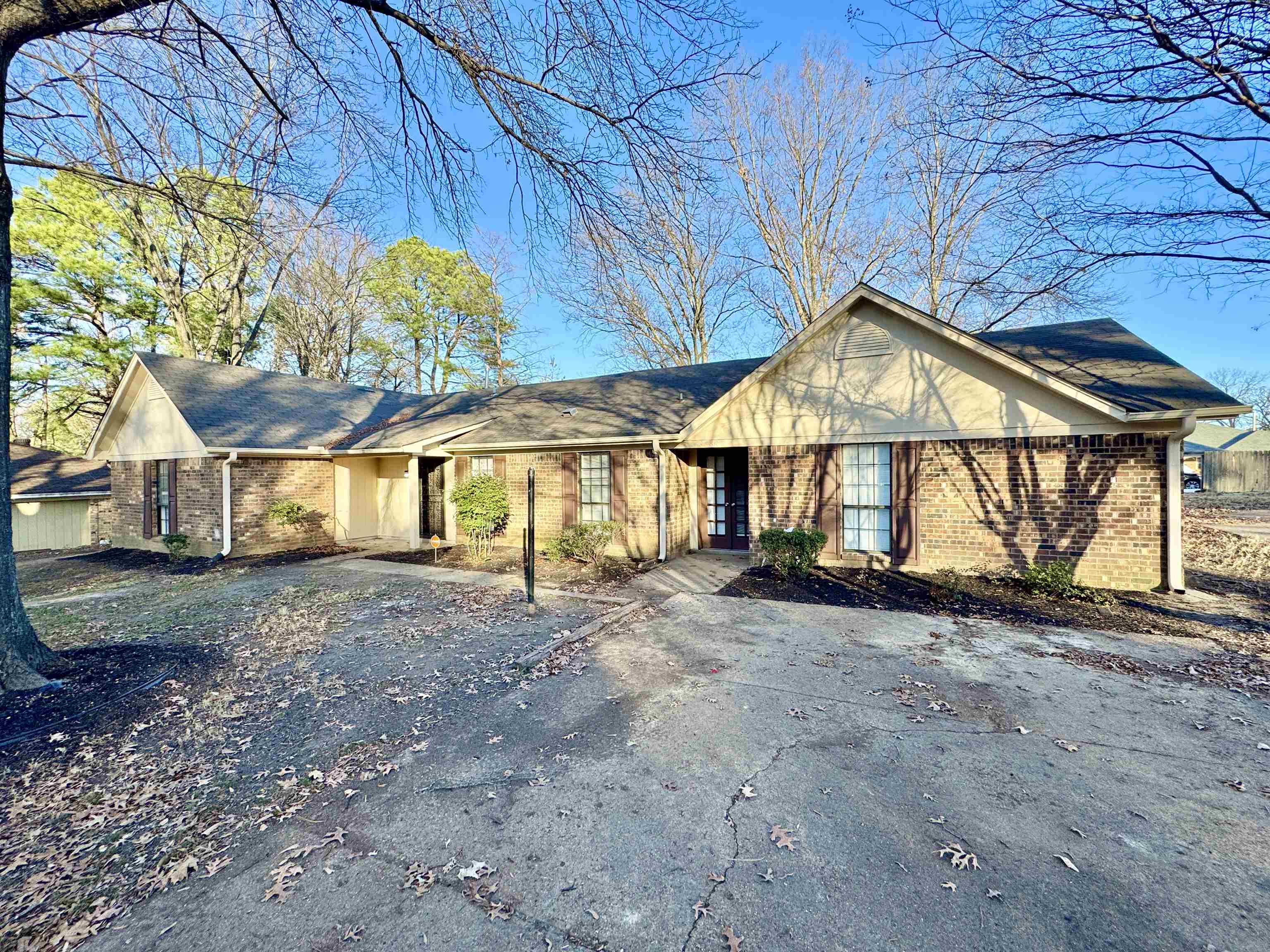 3334 Snow Ridge Cove Memphis, TN 38115 - Photo 37 of 38 a view of a house with a yard and wooden fence