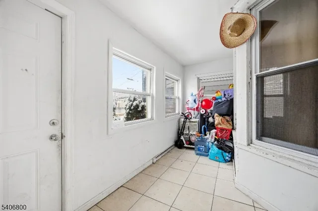 a view of living room with furniture and flowers