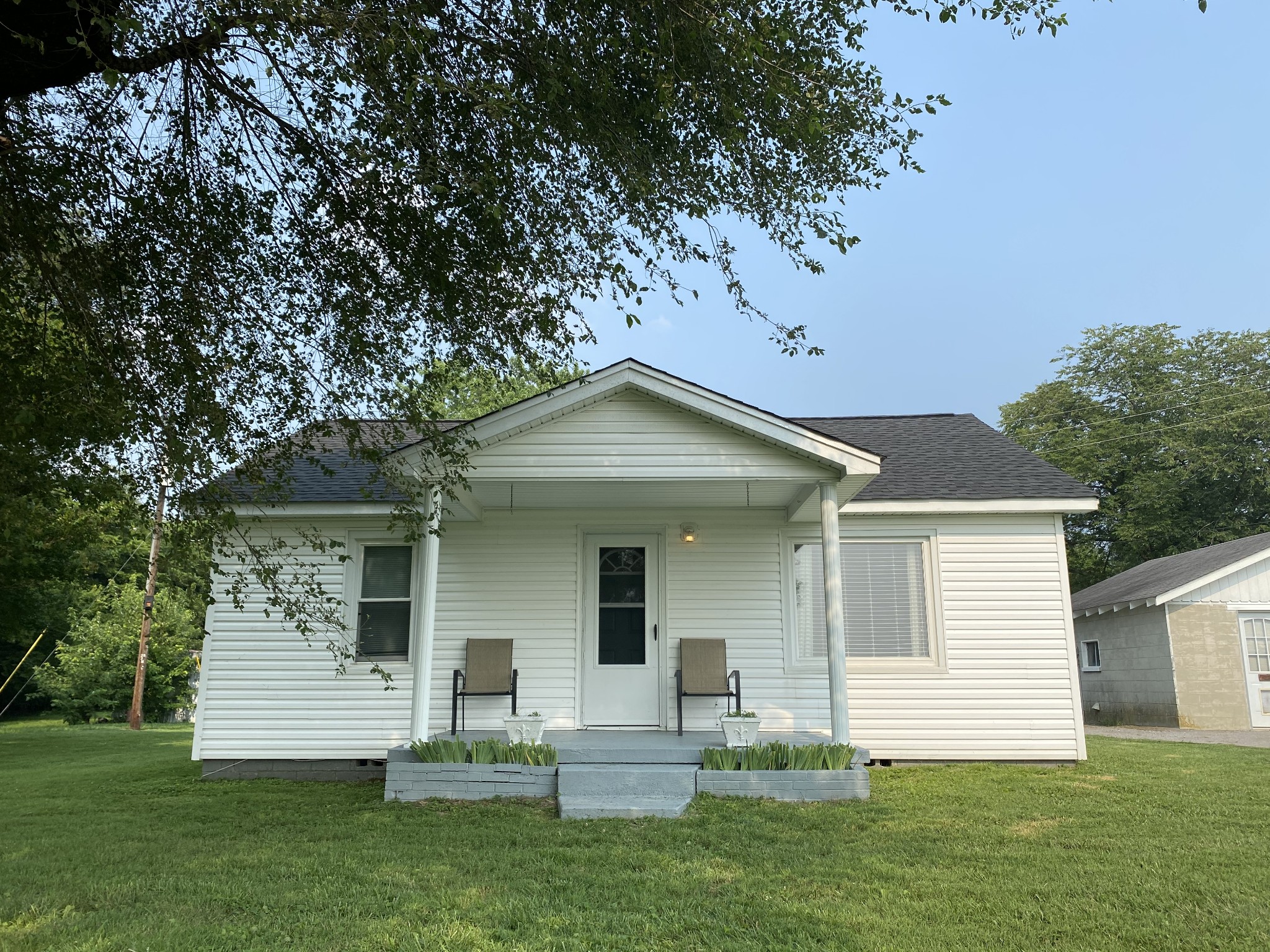 3128 Academy Road Portland, TN 37148 - Photo 3 of 27 a front view of house with yard and green space