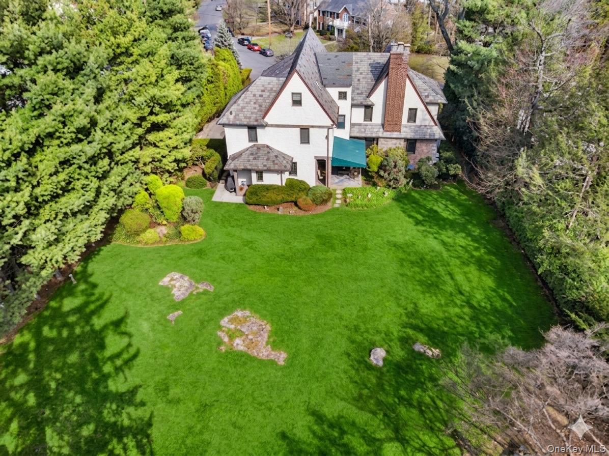 44 Fenimore Road New Rochelle, NY 10804 - Photo 37 of 46 a aerial view of a house with garden
