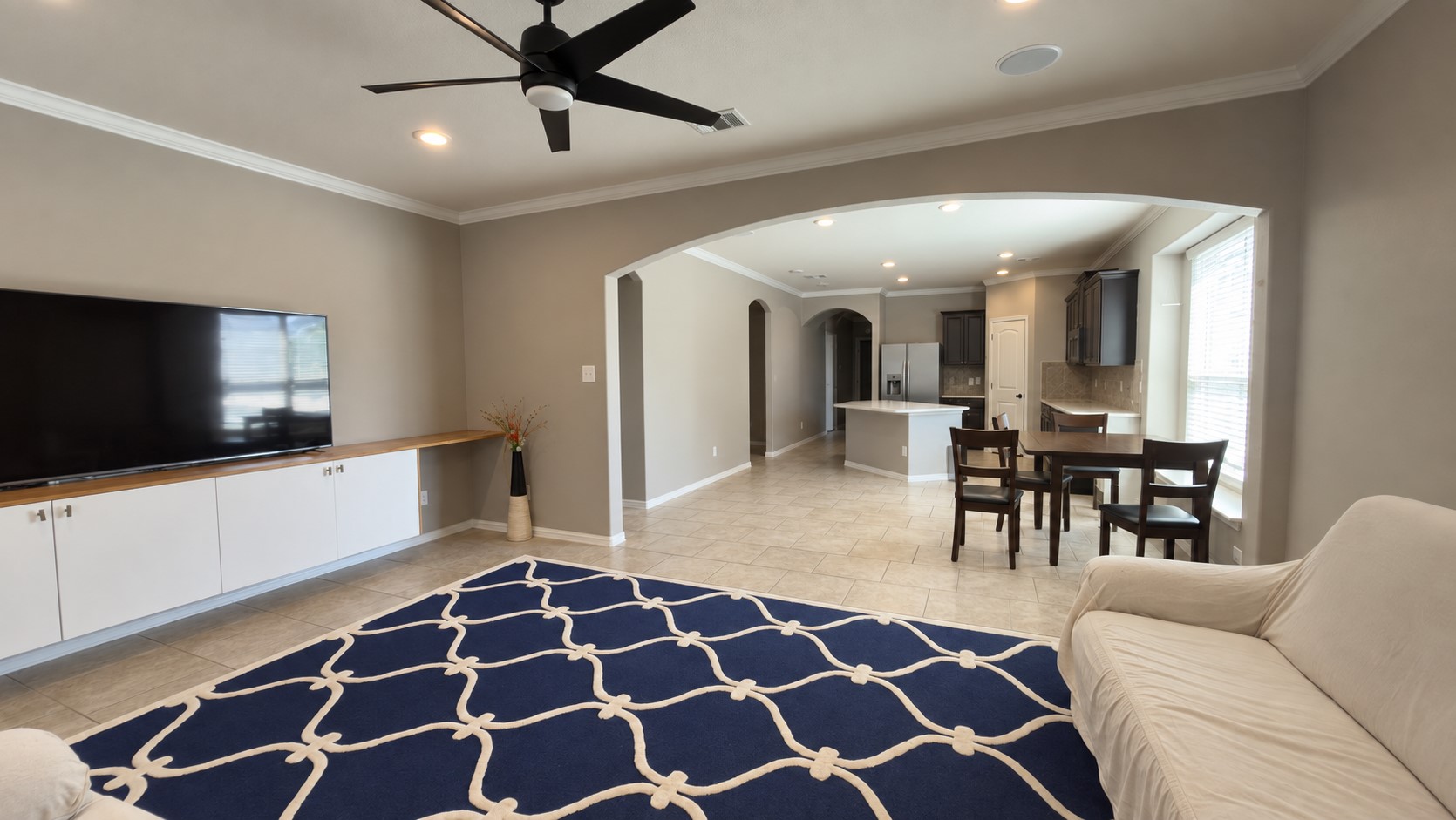 2500 Rough Berry Road Pflugerville, TX 78660 - Photo 15 of 15 An open floor plan connects the comfortable living area to the kitchen and dining space.