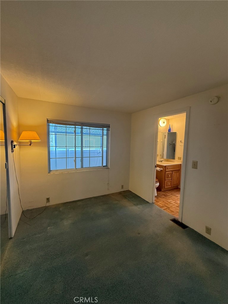 6508 Easy Street, Unit T Carlsbad, CA 92011 - Photo 12 of 19 a view of an empty room with a window