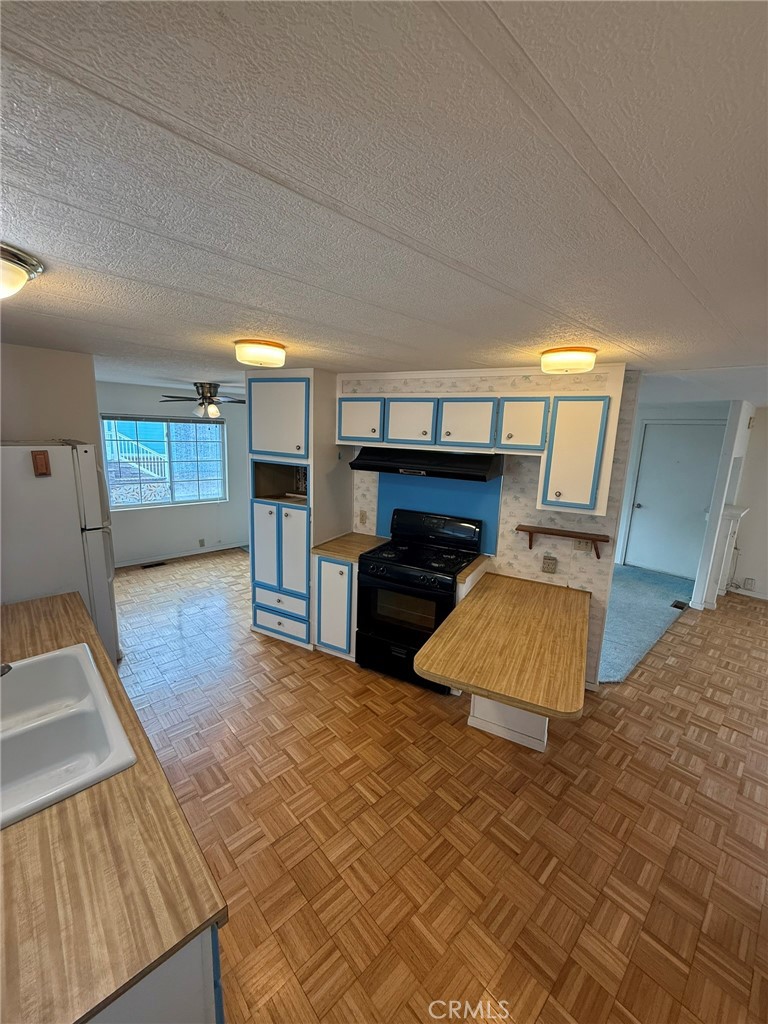 6508 Easy Street, Unit T Carlsbad, CA 92011 - Photo 6 of 19 a bed room with furniture and a fireplace