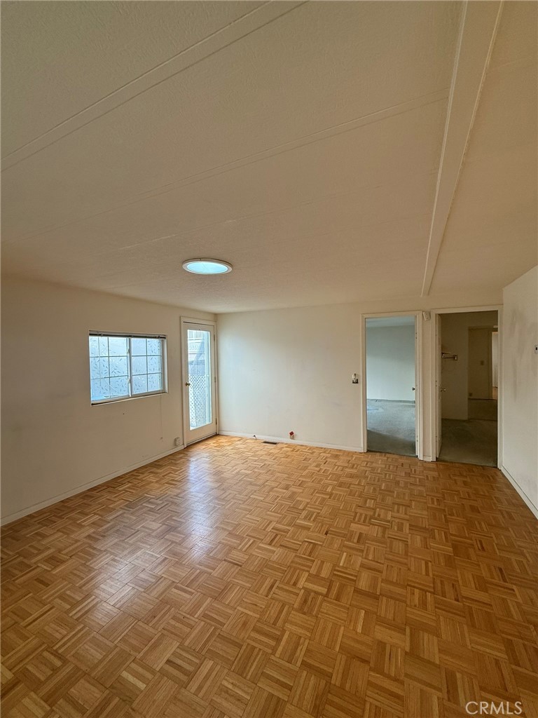 6508 Easy Street, Unit T Carlsbad, CA 92011 - Photo 9 of 19 a view of empty room with window