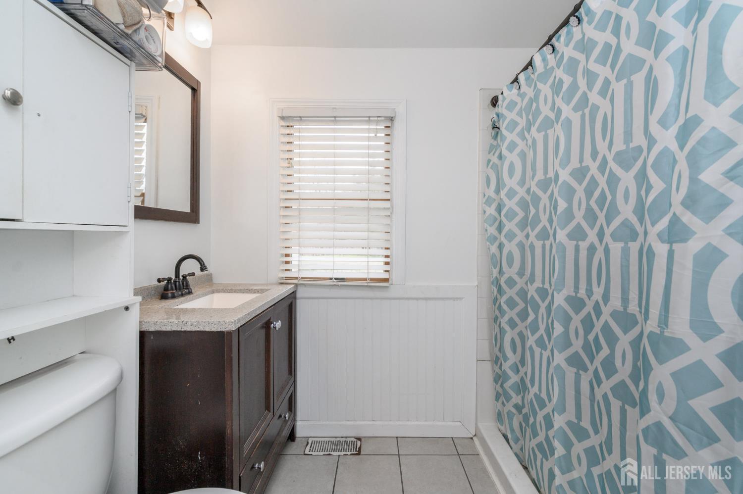 384 Cook Road Jackson, NJ 08527 - Photo 12 of 31 a view of a kitchen with a sink and dishwasher