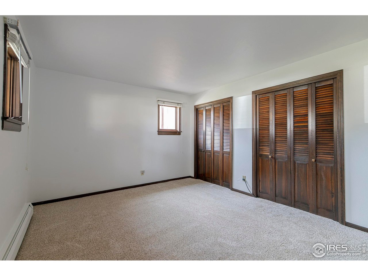6844 Roaring Fork Trail Boulder, CO 80301 - Photo 25 of 37 a view of an empty room with a window