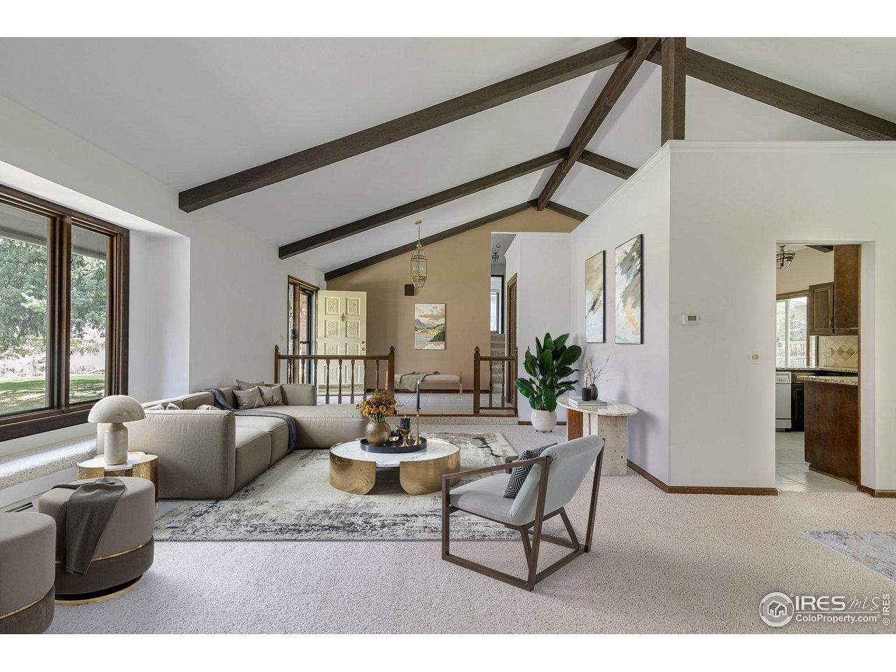 6844 Roaring Fork Trail Boulder, CO 80301 - Photo 3 of 37 a dining room with furniture and wooden floor