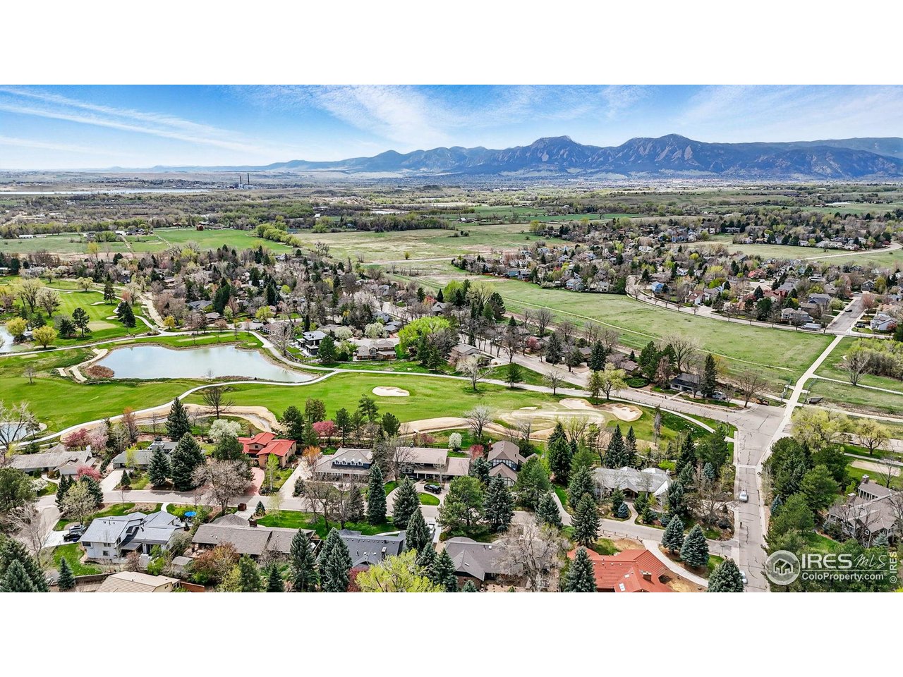 6844 Roaring Fork Trail Boulder, CO 80301 - Photo 35 of 37 a view of a city with an ocean