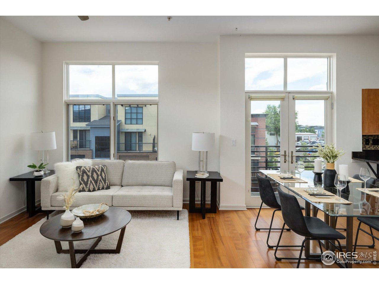 4585 13th Street, Unit D Boulder, CO 80304 - Photo 11 of 30 a living room with furniture and a large window