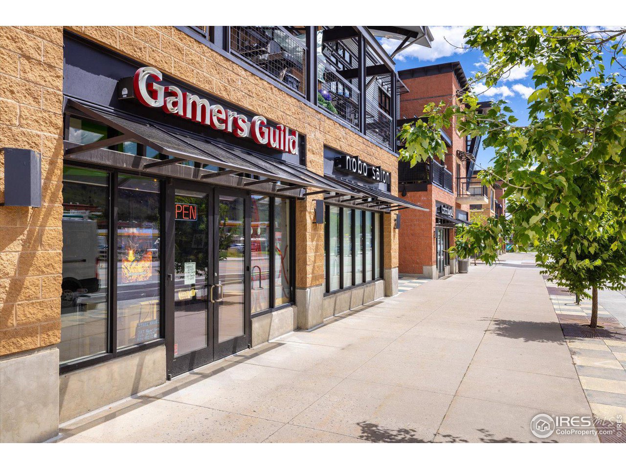 4585 13th Street, Unit D Boulder, CO 80304 - Photo 27 of 30 a view of a building with a tree
