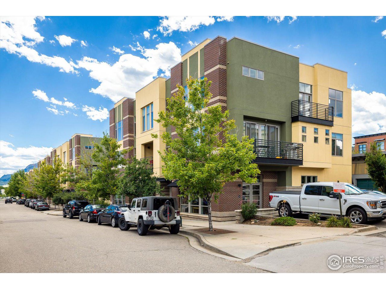 4585 13th Street, Unit D Boulder, CO 80304 - Photo 3 of 30 a car parked in front of a building