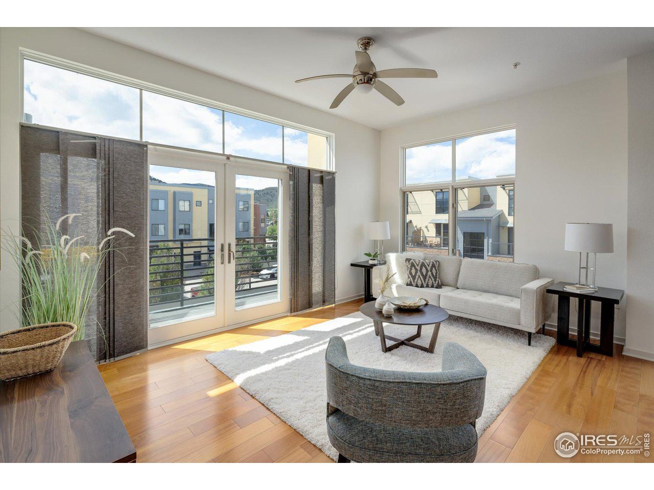 4585 13th Street, Unit D Boulder, CO 80304 - Photo 5 of 30 a living room with furniture and a large window