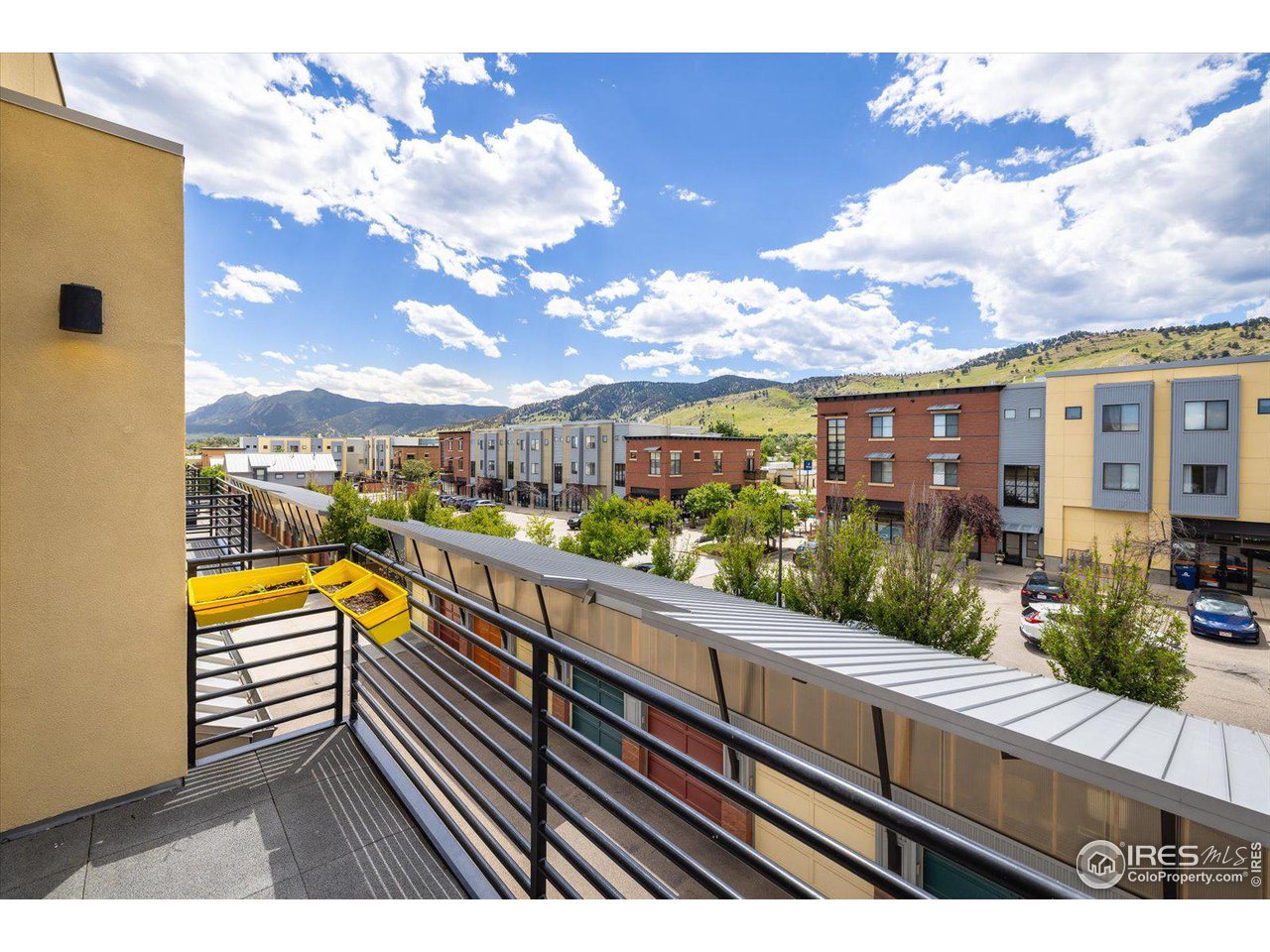 4585 13th Street, Unit D Boulder, CO 80304 - Photo 7 of 30 a view of city from a balcony