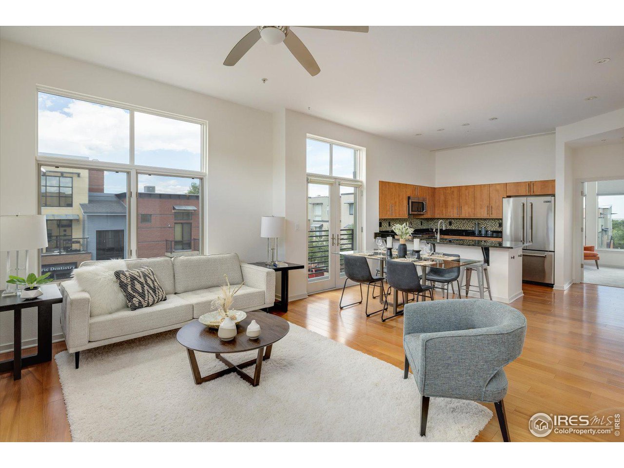 4585 13th Street, Unit D Boulder, CO 80304 - Photo 10 of 30 a living room with furniture and a large window