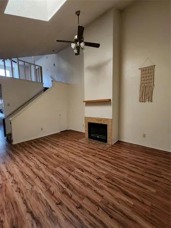 a kitchen with stainless steel appliances a refrigerator stove and microwave
