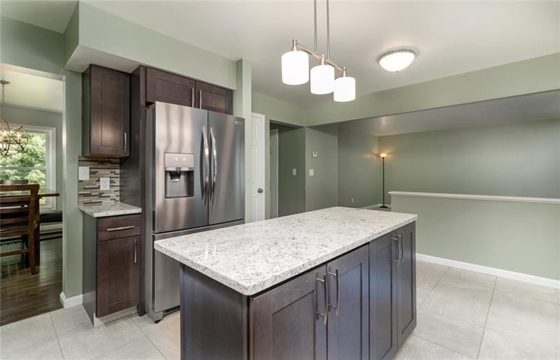 2500 Oakhill Road Gibsonia, PA 15044 - Photo 12 of 25 Kitchen with island, granite counters, new stainless appliances