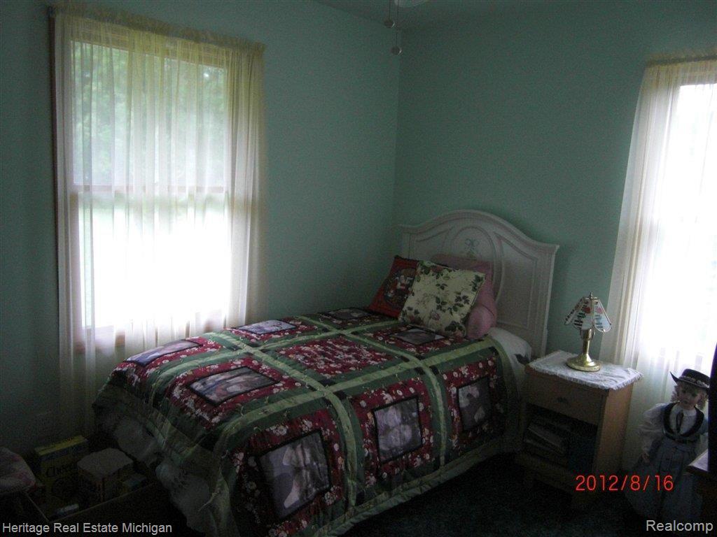 4974 East Columbia Road Webberville, MI 48892 - Photo 10 of 16 third bedroom