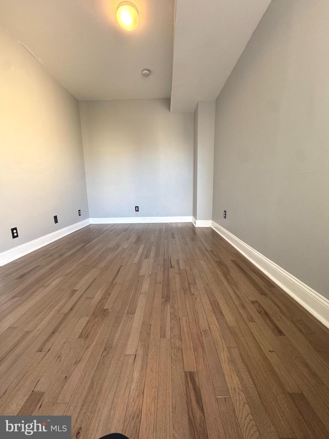 2121 North 20th Street, Unit 2 Philadelphia, PA 19121 - Photo 7 of 9 wooden floor in a room