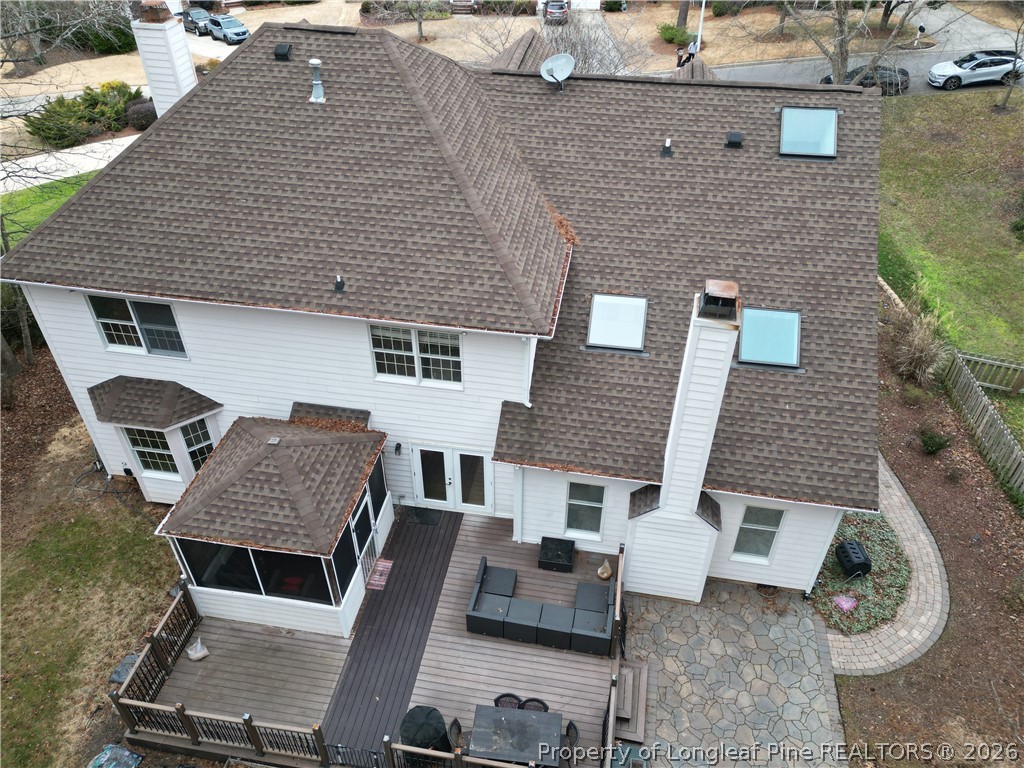 203 Ticonderoga Road Cary, NC 27519 - Photo 3 of 18 an aerial view of a house with a yard and furniture