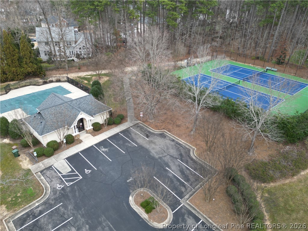 203 Ticonderoga Road Cary, NC 27519 - Photo 5 of 18 a backyard of a house with outdoor seating