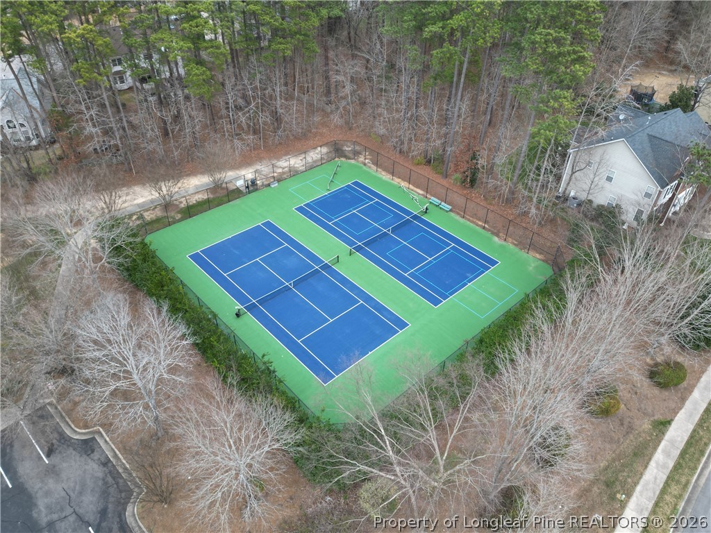 203 Ticonderoga Road Cary, NC 27519 - Photo 7 of 18 a view of a backyard with a small yard