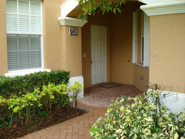 7535 Southwest Herrington Lane, Unit 1277 Stuart, FL 34997 - Photo 1 of 26 Front Exterior Walkway