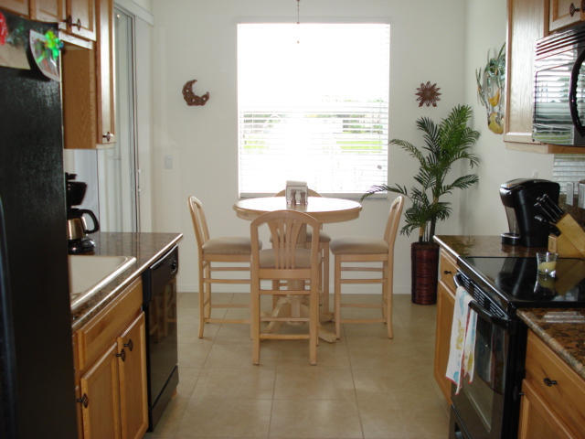 7535 Southwest Herrington Lane, Unit 1277 Stuart, FL 34997 - Photo 2 of 26 Kitchen 1