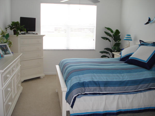 7535 Southwest Herrington Lane, Unit 1277 Stuart, FL 34997 - Photo 4 of 26 Master Bed