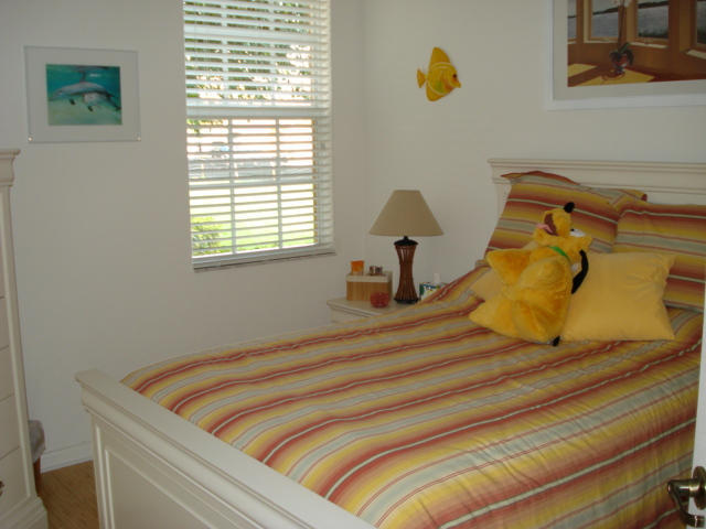 7535 Southwest Herrington Lane, Unit 1277 Stuart, FL 34997 - Photo 7 of 26 Guest bed 1